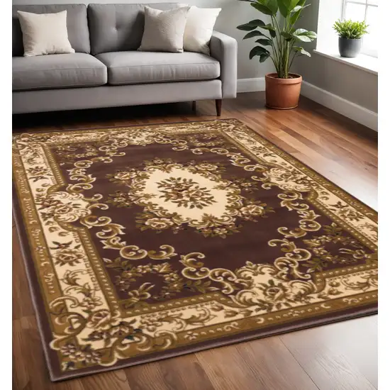 Plum And Ivory Floral Medallion Area Rug Photo 1