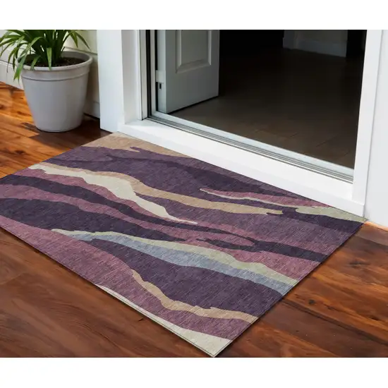 Plum Purple And Ivory Abstract Washable Indoor Outdoor Area Rug Photo 1