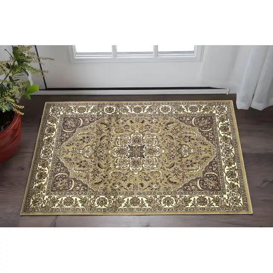 Beige And Ivory Floral Medallion Area Rug Photo 1