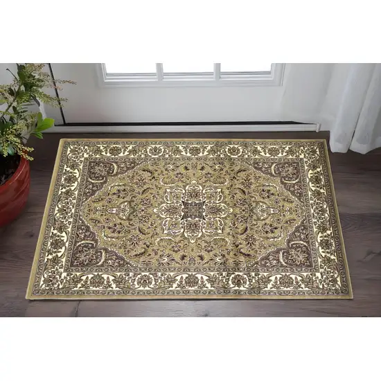 Beige And Ivory Floral Medallion Area Rug Photo 1