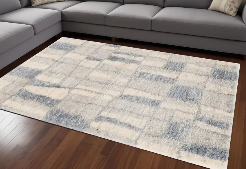 Ivory and Blue Area Rug Photo 1