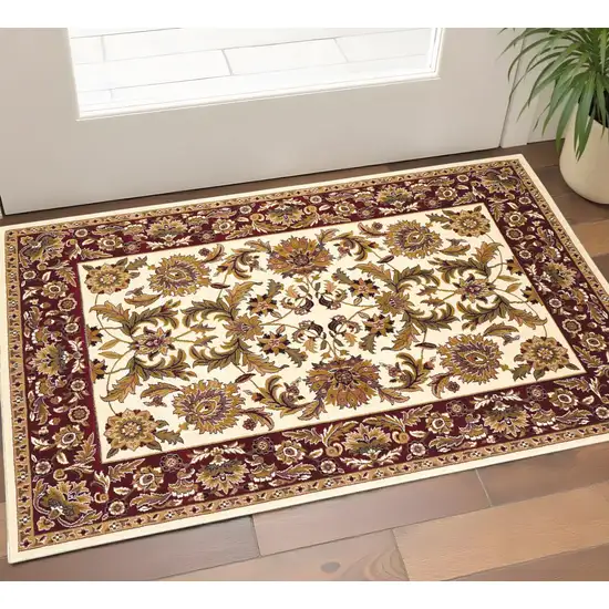 Ivory Red And Orange Floral Medallion Area Rug Photo 1