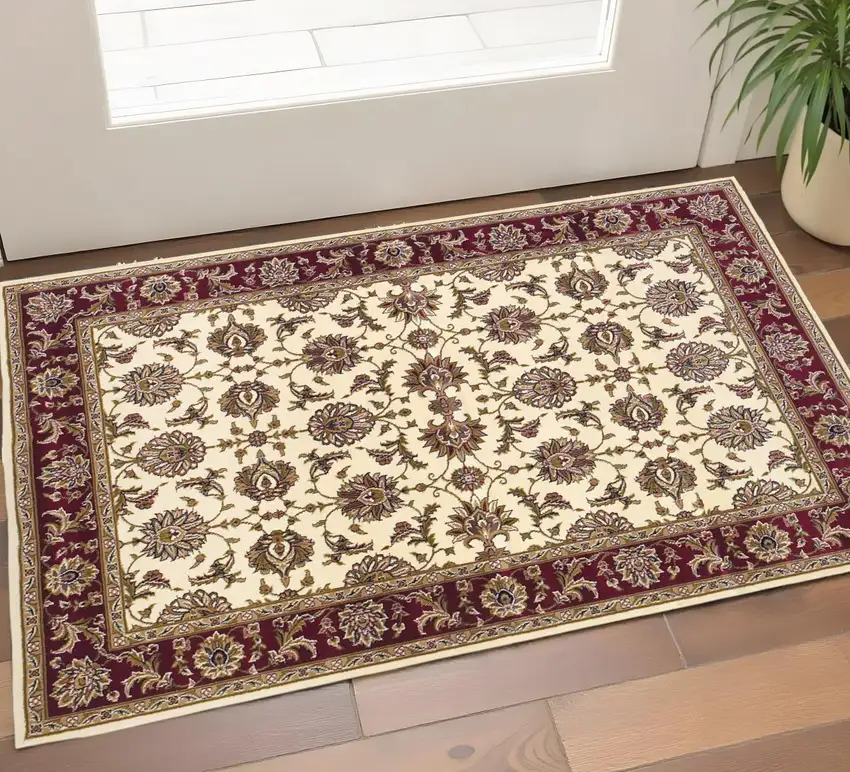 Red Ivory And Brown Floral Medallion Area Rug Photo 1