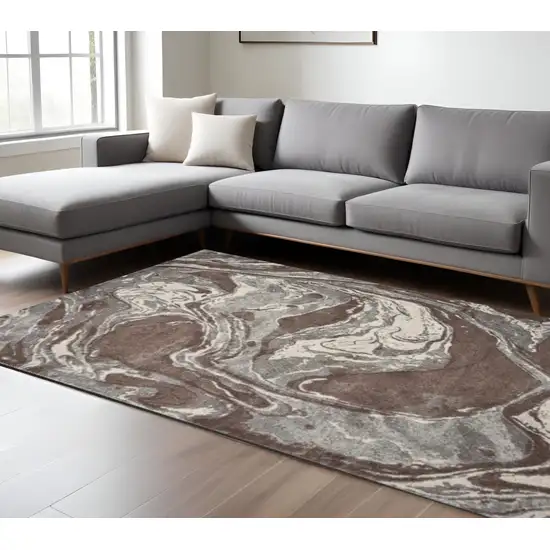 Brown And Ivory Abstract Area Rug Photo 1