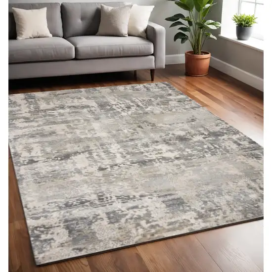Gray And Tan Abstract Area Rug Photo 1