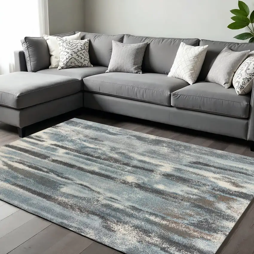 Teal Blue And White Abstract Distressed Area Rug Photo 1