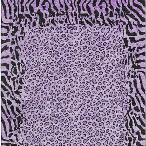 Photo of Purple And Black Animal Print Washable Area Rug With UV Protection