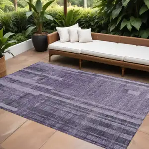 Photo of Purple And Black Striped Washable Indoor Outdoor Area Rug
