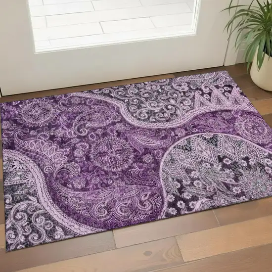 Purple And Charcoal Paisley Washable Area Rug With UV Protection Photo 1