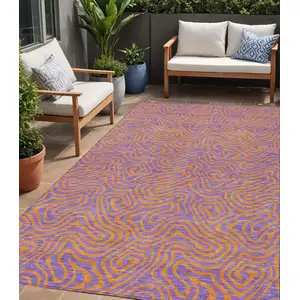 Photo of Purple And Copper Abstract Washable Indoor Outdoor Area Rug