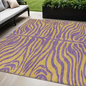 Photo of Purple And Copper Animal Print Washable Indoor Outdoor Area Rug