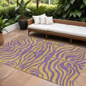 Photo of Purple And Copper Animal Print Washable Indoor Outdoor Area Rug
