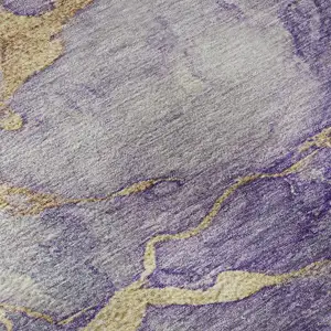 Photo of Purple And Gold Abstract Washable Area Rug With UV Protection