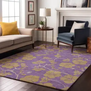 Photo of Purple And Gold Floral Washable Area Rug With UV Protection