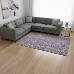 Photo of Purple And Gray Floral Washable Area Rug With UV Protection
