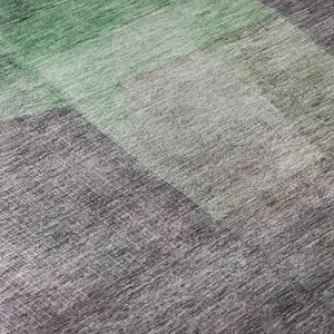 Photo of Purple And Green Abstract Washable Area Rug With UV Protection