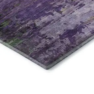 Photo of Purple And Green Abstract Washable Area Rug With UV Protection