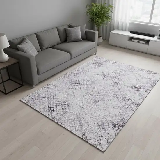 Purple And Ivory Abstract Geometric Washable Area Rug With UV Protection Photo 2