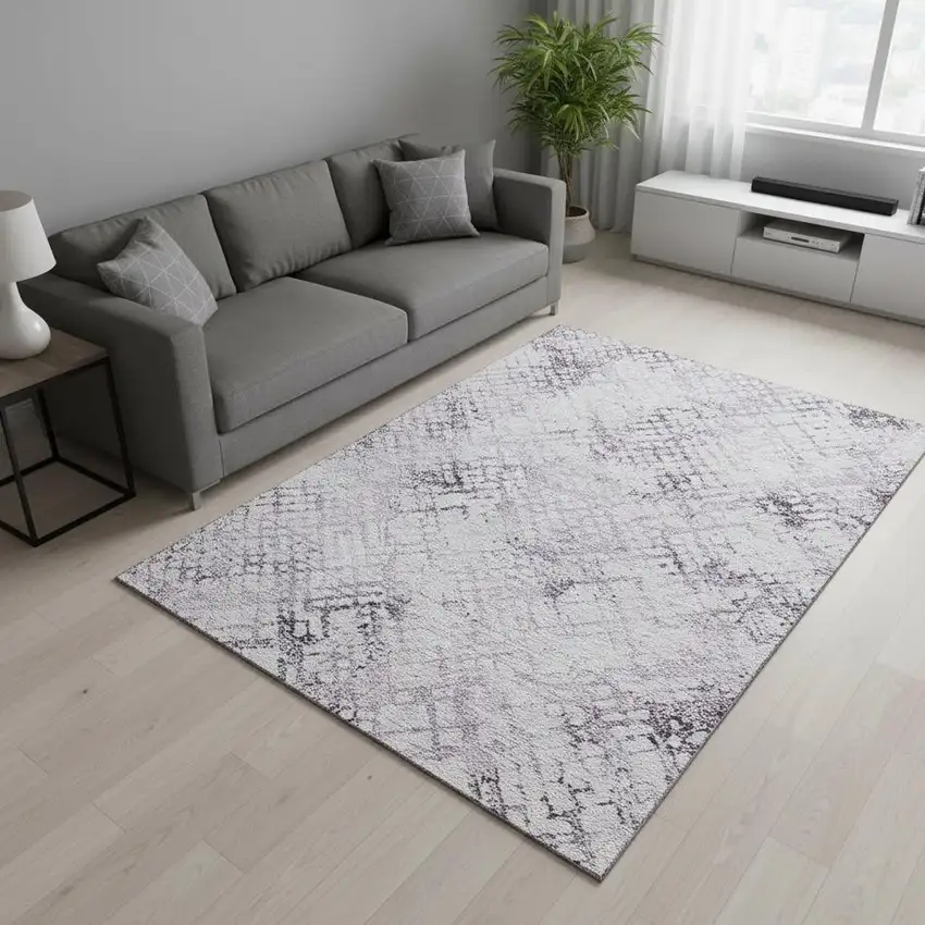 Purple And Ivory Abstract Geometric Washable Area Rug With UV Protection Photo 2