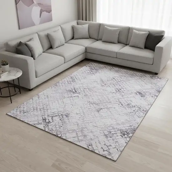 Purple And Ivory Abstract Geometric Washable Area Rug With UV Protection Photo 2