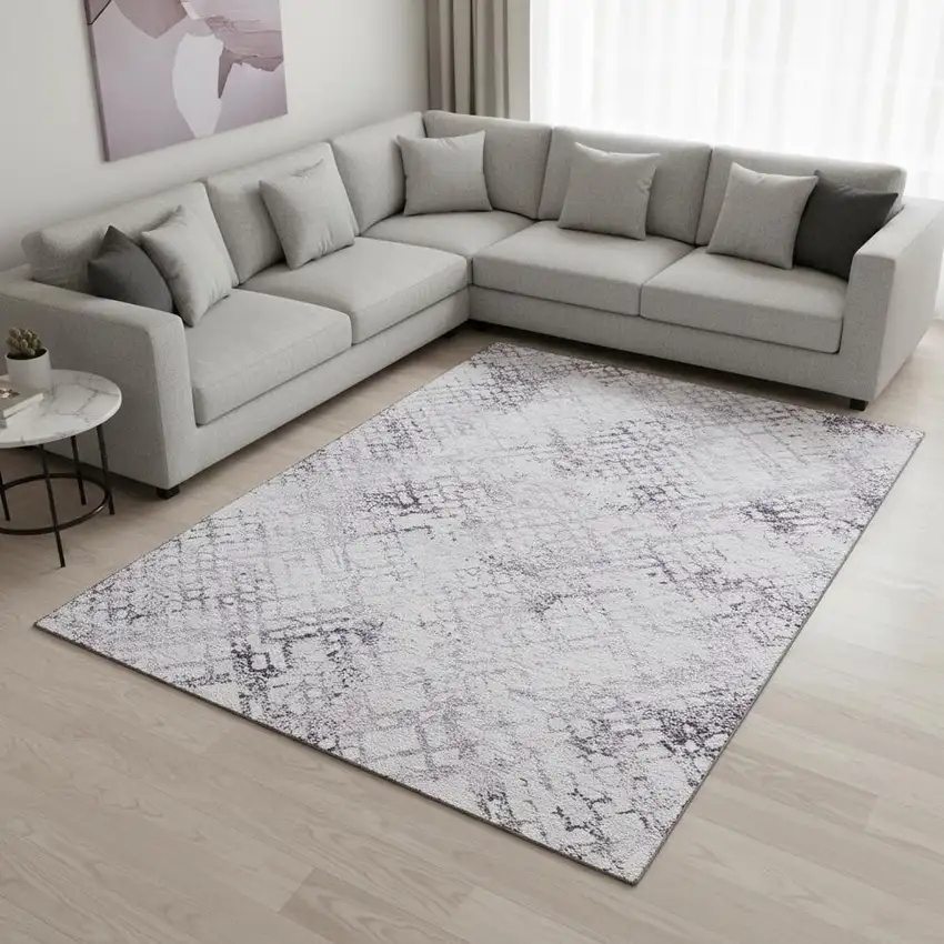 Purple And Ivory Abstract Geometric Washable Area Rug With UV Protection Photo 2