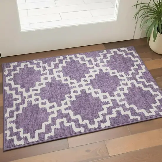 Purple And Ivory Abstract Geometric Washable Area Rug With UV Protection Photo 2