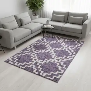 Photo of Purple And Ivory Abstract Geometric Washable Area Rug With UV Protection