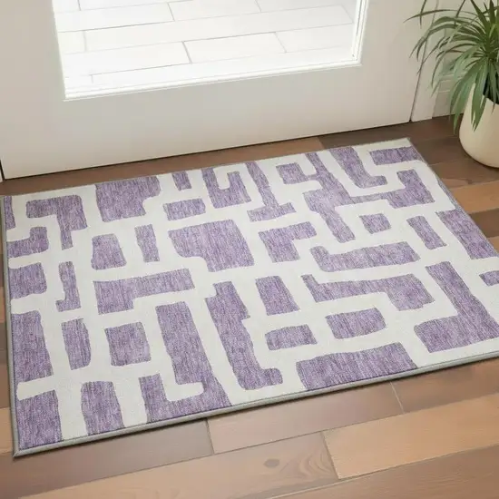 Purple And Ivory Abstract Geometric Washable Area Rug With UV Protection Photo 2