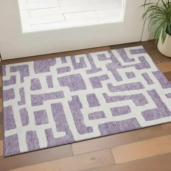 Purple And Ivory Abstract Geometric Washable Area Rug With UV Protection Photo 1