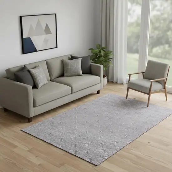 Purple And Ivory Abstract Geometric Washable Area Rug With UV Protection Photo 1