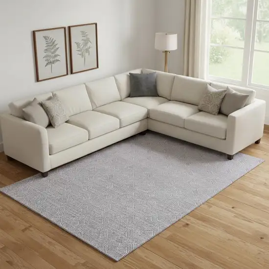 Purple And Ivory Abstract Geometric Washable Area Rug With UV Protection Photo 1