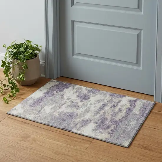 Purple And Ivory Abstract Washable Area Rug With UV Protection Photo 1