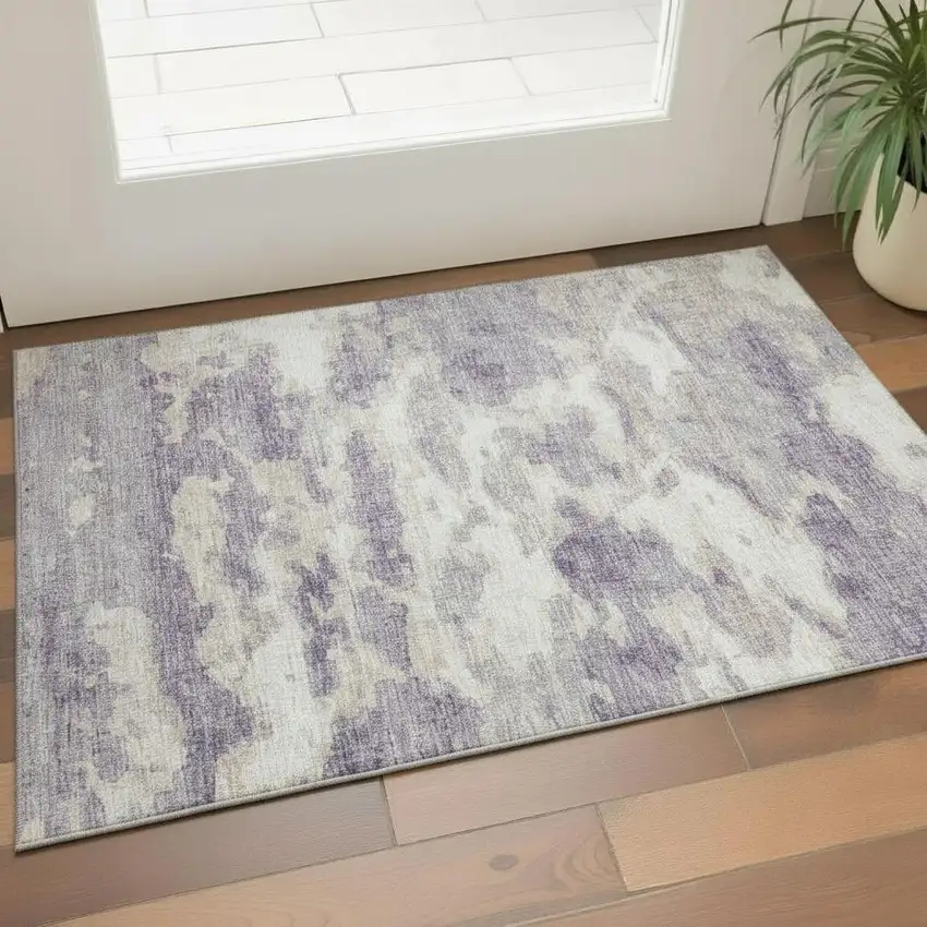 Purple And Ivory Abstract Washable Area Rug With UV Protection Photo 1