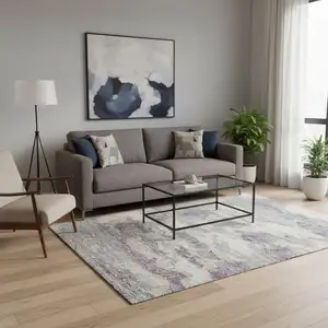 Photo of Purple And Ivory Abstract Washable Area Rug With UV Protection