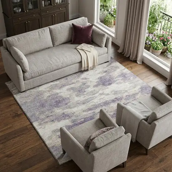 Purple And Ivory Abstract Washable Area Rug With UV Protection Photo 1