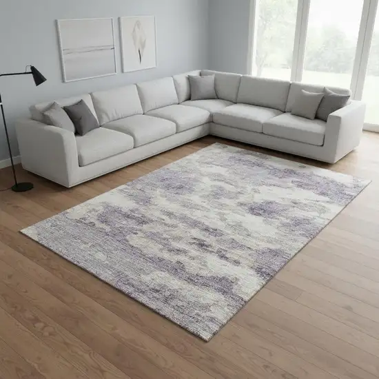 Purple And Ivory Abstract Washable Area Rug With UV Protection Photo 1