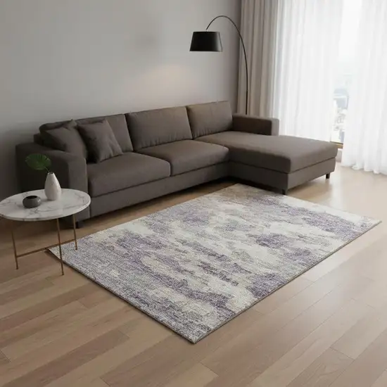 Purple And Ivory Abstract Washable Area Rug With UV Protection Photo 1