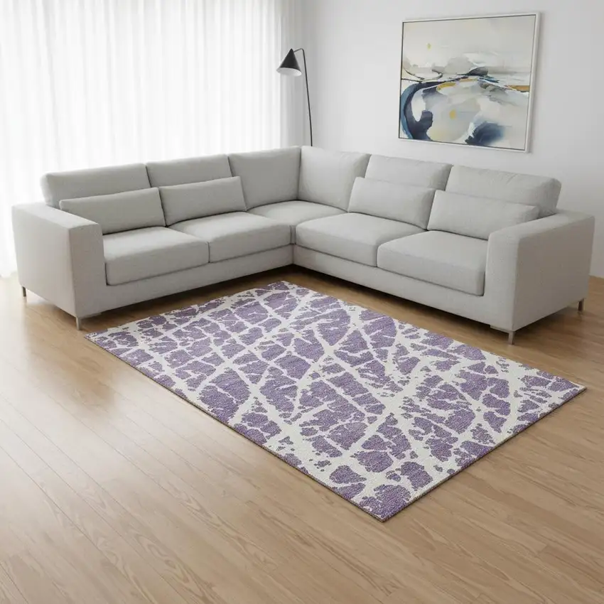 Purple And Ivory Abstract Washable Area Rug With UV Protection Photo 1