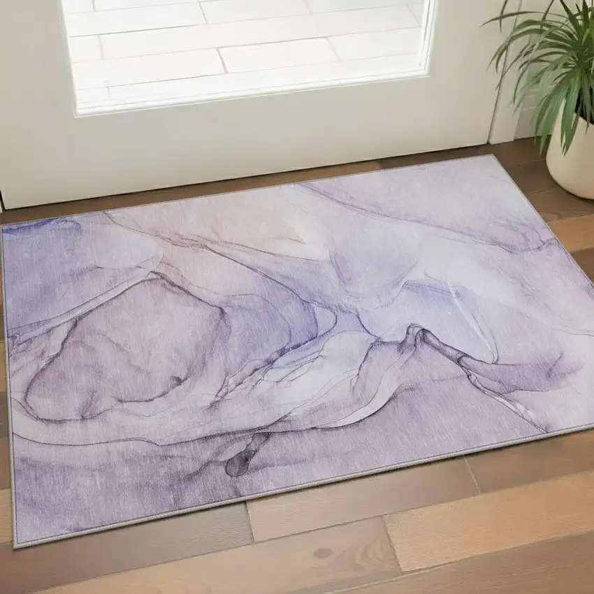 Purple And Ivory Abstract Washable Area Rug With UV Protection Photo 1