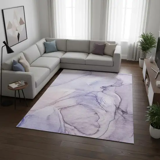 Purple And Ivory Abstract Washable Area Rug With UV Protection Photo 1