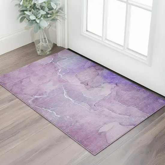 Purple And Ivory Abstract Washable Area Rug With UV Protection Photo 1