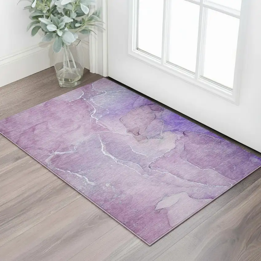 Purple And Ivory Abstract Washable Area Rug With UV Protection Photo 1