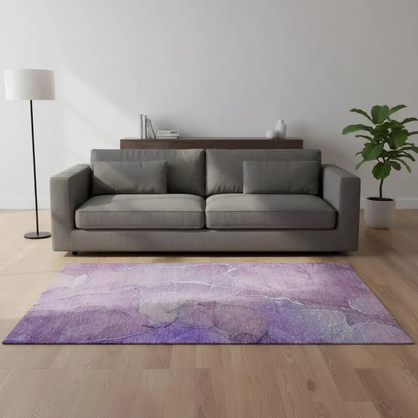 Purple And Ivory Abstract Washable Area Rug With UV Protection Photo 1