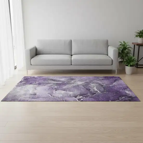 Purple And Ivory Abstract Washable Area Rug With UV Protection Photo 1
