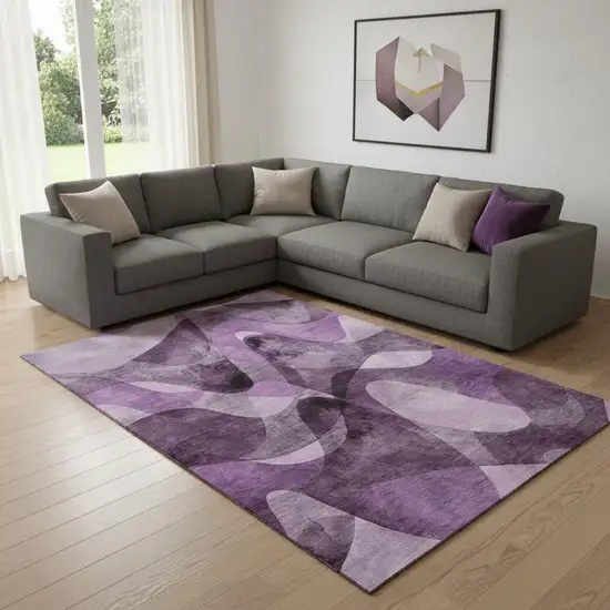 Purple And Ivory Abstract Washable Area Rug With UV Protection Photo 1