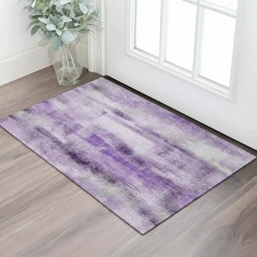 Purple And Ivory Abstract Washable Area Rug With UV Protection Photo 1