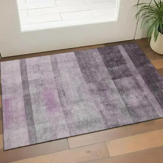 Purple And Ivory Abstract Washable Area Rug With UV Protection Photo 1