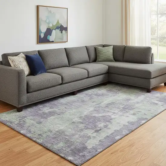 Purple And Ivory Abstract Washable Area Rug With UV Protection Photo 1