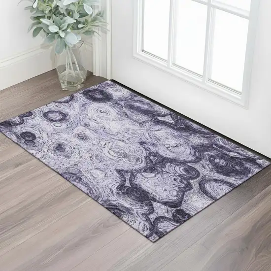 Purple And Ivory Abstract Washable Area Rug With UV Protection Photo 1