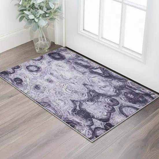 Purple And Ivory Abstract Washable Area Rug With UV Protection Photo 1